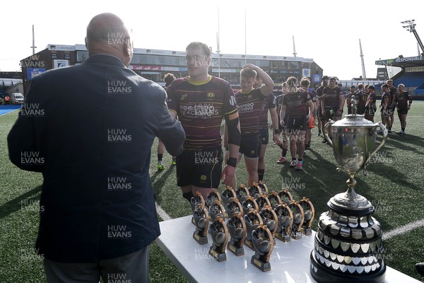230526 - Cardiff Met v Glamorgan Wanderers - Mallet Cup Final - Cardiff met players collect their winners trophies at full time