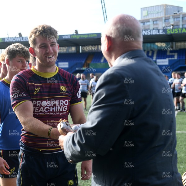 230526 - Cardiff Met v Glamorgan Wanderers - Mallet Cup Final - Cardiff met players collect their winners trophies at full time