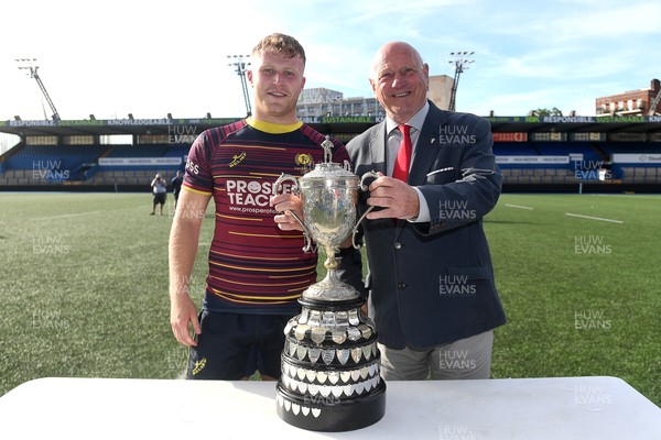 230526 - Cardiff Met v Glamorgan Wanderers - Mallet Cup Final - Ross McKay, (Captain) of Cardiff Met with the trophy at full time