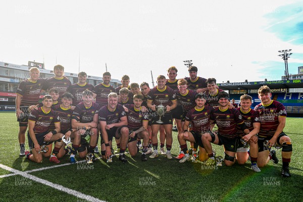 230526 - Cardiff Met v Glamorgan Wanderers - Mallet Cup Final - Cardiff met players celebrate lifting the Mallet cup at full time