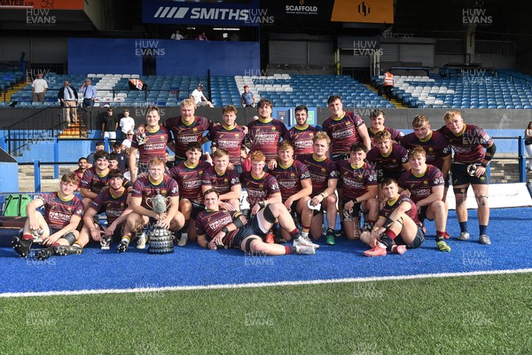 230526 - Cardiff Met v Glamorgan Wanderers - Mallet Cup Final - Cardiff met players celebrate lifting the Mallet cup at full time