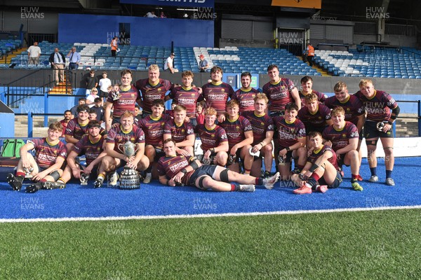 230526 - Cardiff Met v Glamorgan Wanderers - Mallet Cup Final - Cardiff met players celebrate lifting the Mallet cup at full time