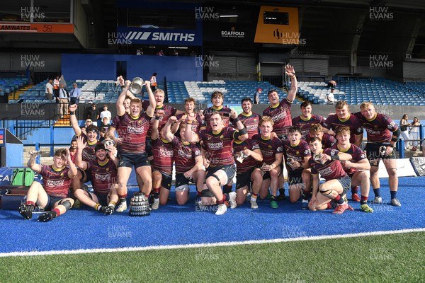 230526 - Cardiff Met v Glamorgan Wanderers - Mallet Cup Final - Cardiff met players celebrate lifting the Mallet cup at full time