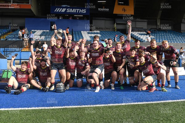 230526 - Cardiff Met v Glamorgan Wanderers - Mallet Cup Final - Cardiff met players celebrate lifting the Mallet cup at full time