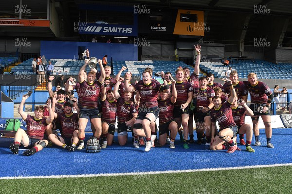 230526 - Cardiff Met v Glamorgan Wanderers - Mallet Cup Final - Cardiff met players celebrate lifting the Mallet cup at full time