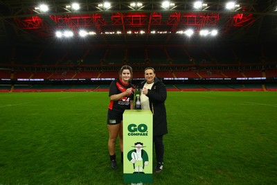 061225 - Cardiff Quins v Gwylliad Meirionnydd - WRU Girls U18 Hub Final - Captain of Gwylliad Meirionnydd Efa Thorp receives the trophy from Siwan Lillicrap of WRU