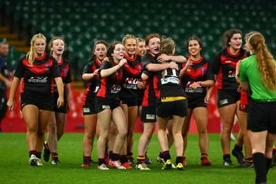 061225 - Cardiff Quins v Gwylliad Meirionnydd - WRU Girls U18 Hub Final - Gwylliad Meirionnydd celebrate winning the game at the final whistle