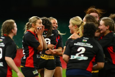 061225 - Cardiff Quins v Gwylliad Meirionnydd - WRU Girls U18 Hub Final - Gwylliad Meirionnydd celebrate winning the game at the final whistle