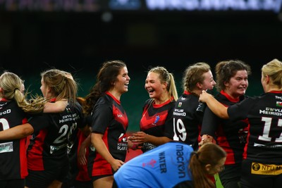 061225 - Cardiff Quins v Gwylliad Meirionnydd - WRU Girls U18 Hub Final - Gwylliad Meirionnydd celebrate winning the game at the final whistle