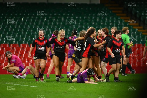 061225 - Cardiff Quins v Gwylliad Meirionnydd - WRU Girls U18 Hub Final - Gwylliad Meirionnydd celebrate winning the game at the final whistle