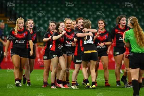 061225 - Cardiff Quins v Gwylliad Meirionnydd - WRU Girls U18 Hub Final - Gwylliad Meirionnydd celebrate winning the game at the final whistle