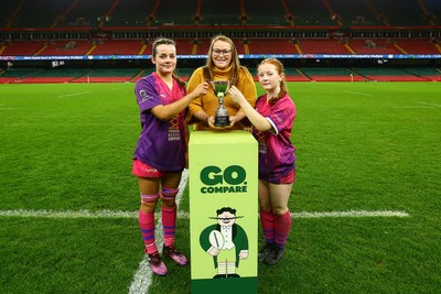 061225 - Cardiff Quins v Nelson Belles - WRU Girls U16 Hub Final - Captains of Cardiff Quins Alys Roberts(L) and Medi Roberts receive the cup from Carol Thomas of WRU