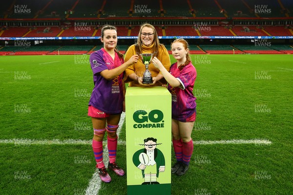 061225 - Cardiff Quins v Nelson Belles - WRU Girls U16 Hub Final - Captains of Cardiff Quins Alys Roberts(L) and Medi Roberts receive the cup from Carol Thomas of WRU