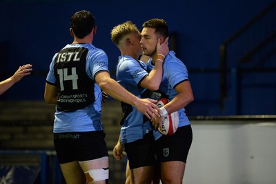 180925 - Cardiff RFC v Carmarthen Quins - Super Rygbi Cymru - Dewi Cross of Cardiff celebrates scoring a try with team mates