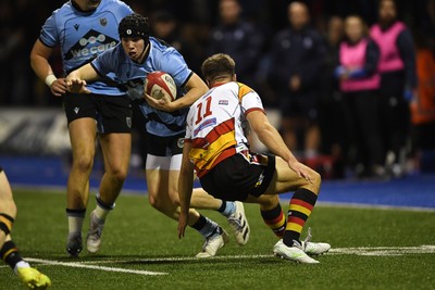 180925 - Cardiff RFC v Carmarthen Quins - Super Rygbi Cymru - Rhys Cummings of Cardiff is challenged by Thomas Williams of Carmarthen