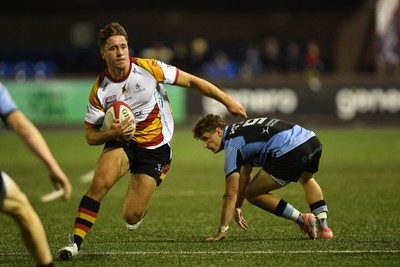 180925 - Cardiff RFC v Carmarthen Quins - Super Rygbi Cymru - Thomas Williams of Carmarthen is challenged by Ieuan Davies of Cardiff