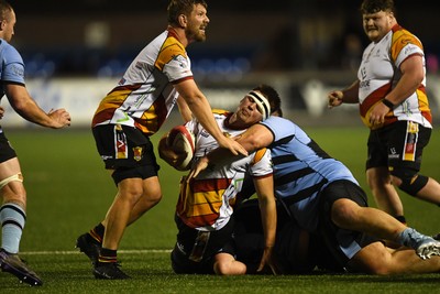 180925 - Cardiff RFC v Carmarthen Quins - Super Rygbi Cymru - Lewys Millin of Carmarthen is challenged by Christian Brooke of Cardiff