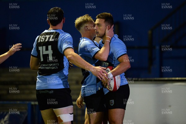 180925 - Cardiff RFC v Carmarthen Quins - Super Rygbi Cymru - Dewi Cross of Cardiff celebrates scoring a try with team mates