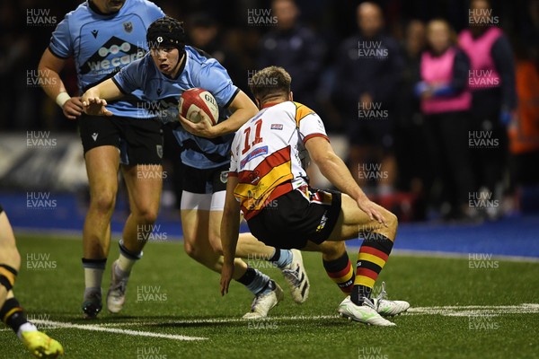 180925 - Cardiff RFC v Carmarthen Quins - Super Rygbi Cymru - Rhys Cummings of Cardiff is challenged by Thomas Williams of Carmarthen