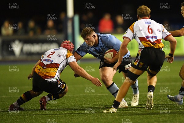 180925 - Cardiff RFC v Carmarthen Quins - Super Rygbi Cymru - Will Davies-King of Cardiff is challenged by Lewis Morgan of Carmarthen