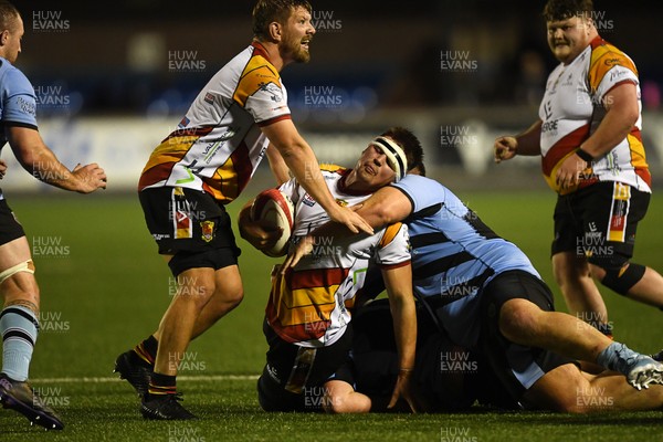 180925 - Cardiff RFC v Carmarthen Quins - Super Rygbi Cymru - Lewys Millin of Carmarthen is challenged by Christian Brooke of Cardiff