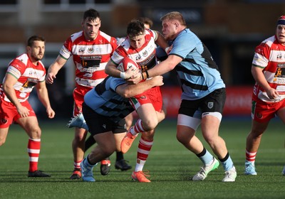 011125 - Cardiff RFC v Llandovery RFC - Super Rygbi Cymru - Steffan-Jac Jones of Llandovery is tackled by Tom Harper and Joe Cowell of Cardiff 