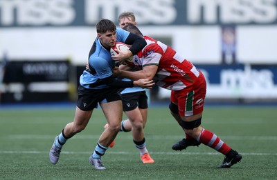 011125 - Cardiff RFC v Llandovery RFC - Super Rygbi Cymru - Steffan Emanuel of Cardiff is tackled by Adam Warren of Llandovery 