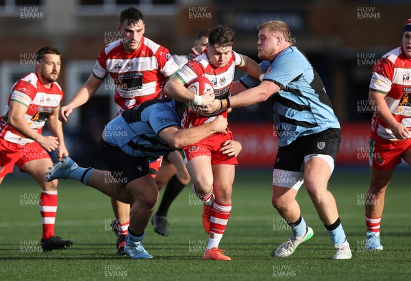 011125 - Cardiff RFC v Llandovery RFC - Super Rygbi Cymru - Steffan-Jac Jones of Llandovery is tackled by Tom Harper and Joe Cowell of Cardiff 