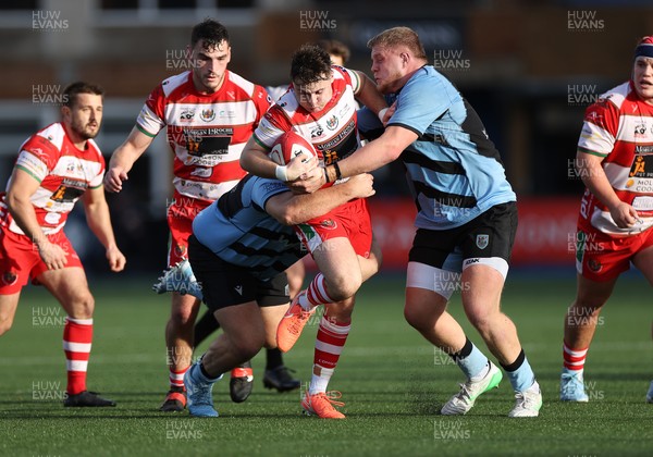 011125 - Cardiff RFC v Llandovery RFC - Super Rygbi Cymru - Steffan-Jac Jones of Llandovery is tackled by Tom Harper and Joe Cowell of Cardiff 