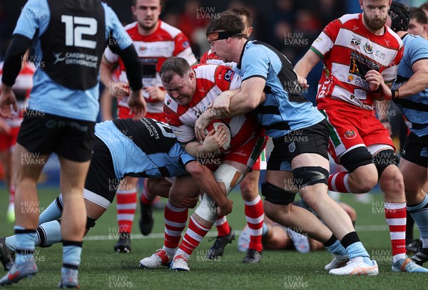 011125 - Cardiff RFC v Llandovery RFC - Super Rygbi Cymru - Berian Watkins of Llandovery is tackled by Lucas de la Rua of Cardiff 