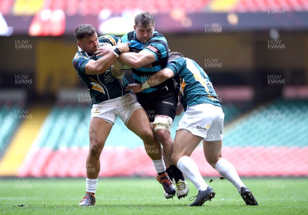 280419 - Cardiff v Merthyr - WRU National Cup Final - Morgan Allen of Cardiff is tackled by Arron Pinches and Adam Thomas of Merthyr