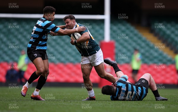 280419 - WRU Finals Day - National Cup - Cardiff RFC v Merthyr RFC - Arron Pinches of Merthyr is tackled by Ben Thomas and Will Rees-Hole of Cardiff