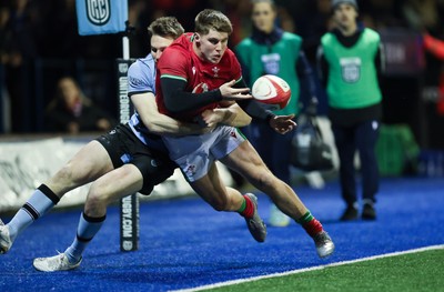 160126 - Cardiff RFC v Wales U20, Friendly match - Seffan Emanuel of Wales is tackled
