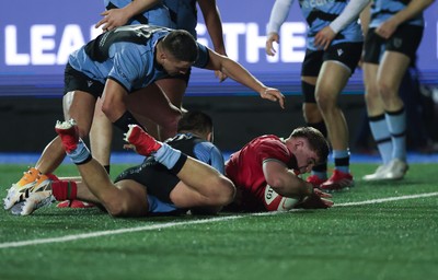 160126 - Cardiff RFC v Wales U20, Friendly match - Oscar Thomas of Wales powers over to score try