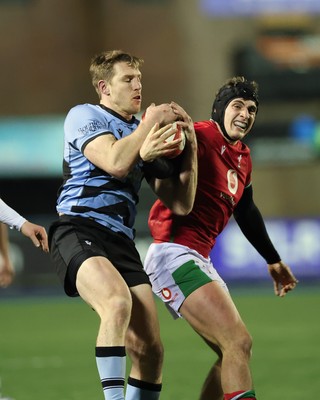 160126 - Cardiff RFC v Wales U20, Friendly match - Tom Williams of Cardiff RFC and Osian Darwin-Lewis of Wales compete for the ball