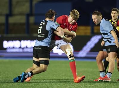 160126 - Cardiff RFC v Wales U20, Friendly match - Osian Williams of Wales is tackled by Aled Ward of Cardiff RFC