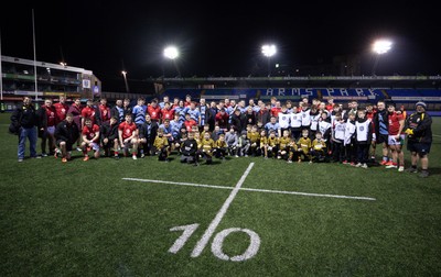 160126 - Cardiff RFC v Wales U20, Friendly match - Players and management from both teams join the guard of honour and ball team at the end of the match
