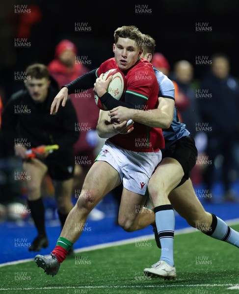160126 - Cardiff RFC v Wales U20, Friendly match - Seffan Emanuel of Wales is tackled