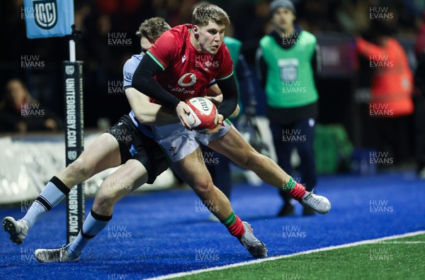 160126 - Cardiff RFC v Wales U20, Friendly match - Seffan Emanuel of Wales is tackled