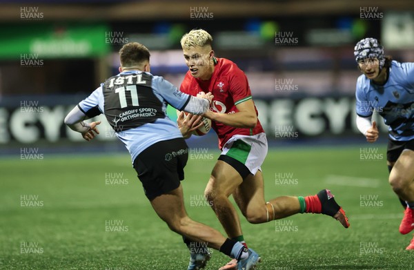 160126 - Cardiff RFC v Wales U20, Friendly match - Evan Morris of Wales takes on Dewi Cross of Cardiff RFC