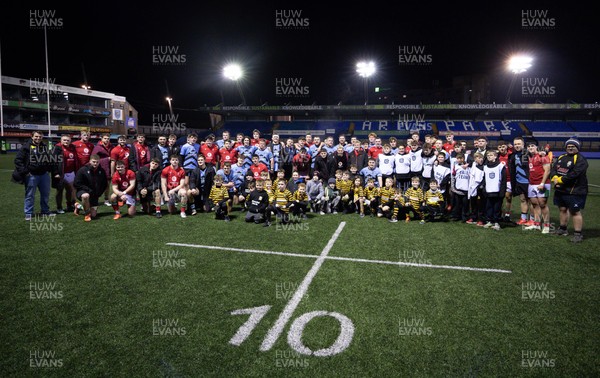 160126 - Cardiff RFC v Wales U20, Friendly match - Players and management from both teams join the guard of honour and ball team at the end of the match