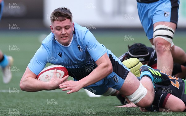 290123 - Cardiff Rugby 18s v RGC U18s Under 18s, WRU Regional Age Grade Championship - Evan Rees of Cardiff is tackled