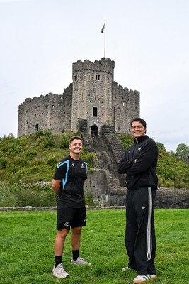 290926 - Cardiff Rugby Press Conference - Picture shows Cardiff Rugby players Callum Sheedy (left) and Teddy Williams outside Cardiff Castle in Cardiff, Wales during a press conference ahead of their sides URC match against Zebre