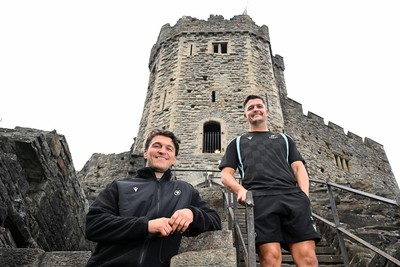 290926 - Cardiff Rugby Press Conference - Picture shows Cardiff Rugby players Callum Sheedy and Teddy Williams (left) outside Cardiff Castle in Cardiff, Wales during a press conference ahead of their sides URC match against Zebre