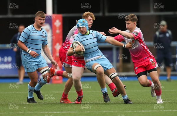 250821 - Cardiff Rugby U17s v Dragons Red U17s - Fletcher Barry of Cardiff Rugby is held