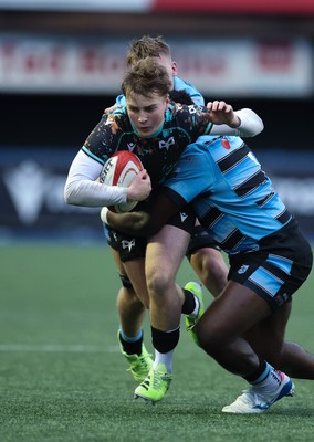 110126 - Cardiff Rugby U18s v Ospreys U18, WRU U18 Regional Age Grade Championship -  Zac Mizen of Ospreys takes on Evan Hughes of Cardiff Rugby and Brayan Kamanga of Cardiff Rugby