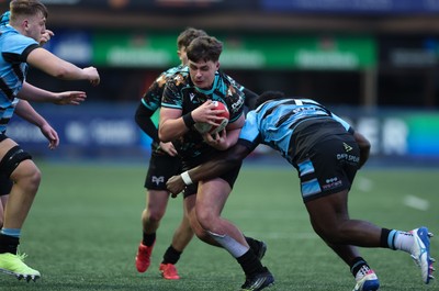 110126 - Cardiff Rugby U18s v Ospreys U18, WRU U18 Regional Age Grade Championship -  Aled Davies of Ospreys takes on Brayan Kamanga of Cardiff Rugby
