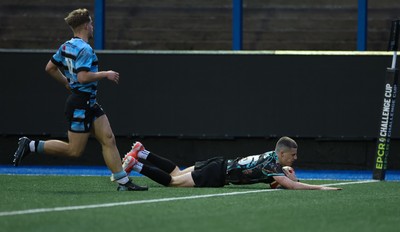 110126 - Cardiff Rugby U18s v Ospreys U18, WRU U18 Regional Age Grade Championship -  Dylan Quinn of Ospreys races in to score try