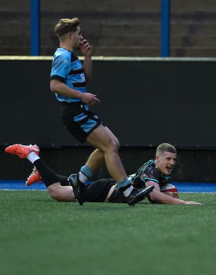 110126 - Cardiff Rugby U18s v Ospreys U18, WRU U18 Regional Age Grade Championship -  Dylan Quinn of Ospreys races in to score try