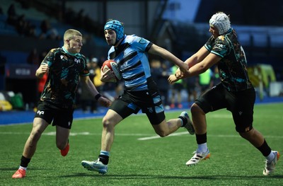 110126 - Cardiff Rugby U18s v Ospreys U18, WRU U18 Regional Age Grade Championship -  Harry Kinsey of Cardiff Rugby is tackled just short of the line